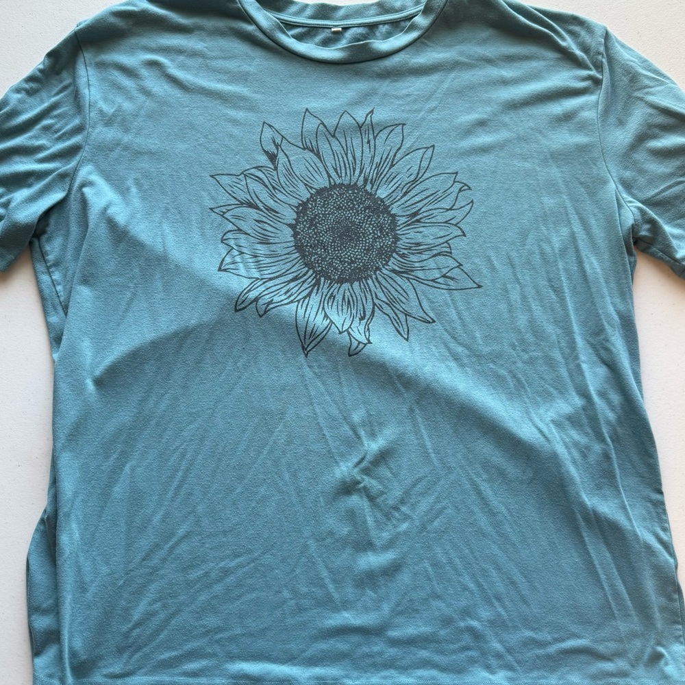 Amazon Women's Short Sleeve Teal Blue Tee with Black Sunflower Graphic